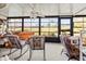Spacious screened porch overlooking a grassy area at 6135 Heritage Ln # 6135, Bradenton, FL 34209