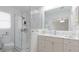 Modern bathroom with marble shower and white vanity at 6726 S Lockwood Ridge Rd, Sarasota, FL 34231