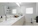 Clean bathroom with marble countertop and walk-in shower at 6726 S Lockwood Ridge Rd, Sarasota, FL 34231