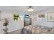 Bedroom with neutral decor and large windows at 6726 S Lockwood Ridge Rd, Sarasota, FL 34231