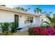 Modern front porch with seating area and landscaping at 6726 S Lockwood Ridge Rd, Sarasota, FL 34231
