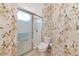 Bathroom with a walk in shower and updated toilet at 7107 Cedar Hollow Cir, Bradenton, FL 34203