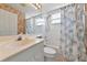 Clean bathroom with a shower/tub combo and updated vanity at 7107 Cedar Hollow Cir, Bradenton, FL 34203
