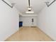 Spacious garage with light, and floor at 7107 Cedar Hollow Cir, Bradenton, FL 34203