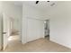 Spacious bedroom with wood floors and large closet at 75 Mark Twain Ln, Rotonda West, FL 33947