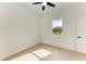 Bright bedroom with wood floors and ceiling fan at 75 Mark Twain Ln, Rotonda West, FL 33947