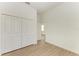 Bright bedroom with wood floors and a large closet at 75 Mark Twain Ln, Rotonda West, FL 33947