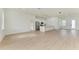 Open concept kitchen with stainless steel appliances and white shaker cabinets at 75 Mark Twain Ln, Rotonda West, FL 33947