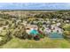 Community pool, tennis court, and playground at 7825 112Th E Ave, Parrish, FL 34219