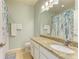 Clean bathroom with granite countertop, shower, and updated vanity at 7825 112Th E Ave, Parrish, FL 34219