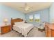 Bright bedroom with ceiling fan and en-suite bathroom at 7825 112Th E Ave, Parrish, FL 34219