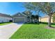Attractive one-story home with a well-manicured lawn at 7825 112Th E Ave, Parrish, FL 34219