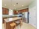 Kitchen with stainless steel appliances and granite countertop island at 7825 112Th E Ave, Parrish, FL 34219