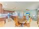 Kitchen with an island, breakfast nook, and stainless steel appliances at 7825 112Th E Ave, Parrish, FL 34219
