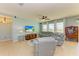 Open living room with comfy seating and large windows at 7825 112Th E Ave, Parrish, FL 34219