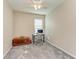 Home office with a desk, chair, and large window at 7825 112Th E Ave, Parrish, FL 34219