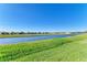 Community canal view with lush landscaping at 7825 112Th E Ave, Parrish, FL 34219