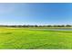 Community canal view with lush landscaping at 7825 112Th E Ave, Parrish, FL 34219