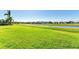 Community canal view with lush landscaping at 7825 112Th E Ave, Parrish, FL 34219