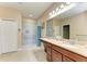 Bathroom with double vanity and walk-in shower at 7923 111Th E Ter, Parrish, FL 34219