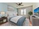 Spacious bedroom with plush bed and large TV at 7923 111Th E Ter, Parrish, FL 34219