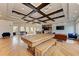 Community room with hardwood floors and comfortable seating at 7923 111Th E Ter, Parrish, FL 34219