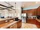 Well-equipped community kitchen with ample counter space at 7923 111Th E Ter, Parrish, FL 34219