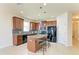 Kitchen boasts granite countertops and a breakfast bar at 7923 111Th E Ter, Parrish, FL 34219