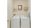 Convenient laundry room with washer and dryer at 7923 111Th E Ter, Parrish, FL 34219
