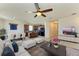 Open living area with modern furniture and kitchen views at 7923 111Th E Ter, Parrish, FL 34219