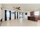 Spacious living room features a fireplace and access to the backyard at 7923 111Th E Ter, Parrish, FL 34219