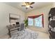 Home office with desk, chair, and natural light at 7923 111Th E Ter, Parrish, FL 34219