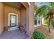 Covered porch with seating area, providing a relaxing outdoor space at 7923 111Th E Ter, Parrish, FL 34219