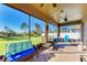 Enjoy the view from this screened porch with comfy seating at 7923 111Th E Ter, Parrish, FL 34219