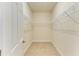 Large walk-in closet with double hanging rods and shelving at 7923 111Th E Ter, Parrish, FL 34219