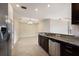 Granite countertop kitchen with stainless steel appliances at 8199 Varenna Dr, Sarasota, FL 34231