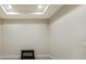 Empty room with neutral walls and a small bench at 8199 Varenna Dr, Sarasota, FL 34231