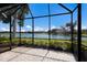 Enjoy serene lake views from this screened patio at 8199 Varenna Dr, Sarasota, FL 34231
