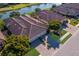 Aerial view of home and community with lake access at 8224 Varenna Dr, Sarasota, FL 34231