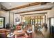 Spacious clubhouse interior with comfortable seating and large windows at 8224 Varenna Dr, Sarasota, FL 34231