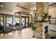 Relaxing clubhouse lounge area with fireplace and comfortable seating at 8224 Varenna Dr, Sarasota, FL 34231