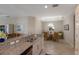 Kitchen features granite countertops, stainless steel appliances, and breakfast bar at 8224 Varenna Dr, Sarasota, FL 34231