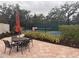 Relaxing patio area with seating near pickleball at 8224 Varenna Dr, Sarasota, FL 34231