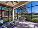 Relaxing screened patio overlooking the lake at 8224 Varenna Dr, Sarasota, FL 34231