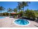 Community spa with ample surrounding space at 8224 Varenna Dr, Sarasota, FL 34231
