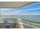 Spacious balcony with water views and seating for two at 888 Blvd Of The Arts # 1408, Sarasota, FL 34236