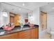 Bathroom with double sinks, granite countertop, and a bathtub at 888 Blvd Of The Arts # 1408, Sarasota, FL 34236
