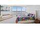 Bedroom with a king-size bed and water views at 888 Blvd Of The Arts # 1408, Sarasota, FL 34236