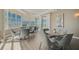 Common area with tables and chairs, offering water views at 888 Blvd Of The Arts # 1408, Sarasota, FL 34236