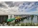 Community dock with kayaks and boat slips at 888 Blvd Of The Arts # 1408, Sarasota, FL 34236